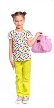 Little fashion girl with bag. Isolated white backround.