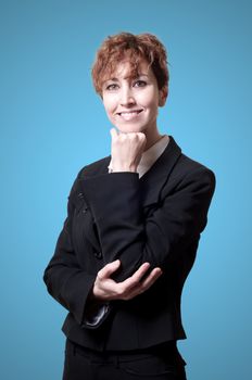 smiling success short hair business woman on blue background