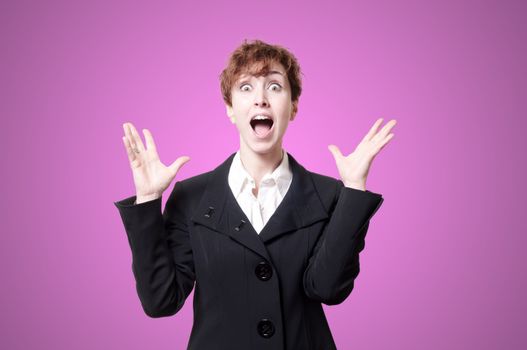 surprised success short hair business woman on pink background