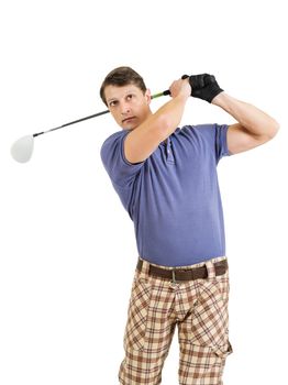 Photo of a male golfer in his late twenties finishing his swing with a driver.

