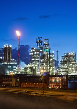 Illuminated petrochemical plant in twilight (Antwerp port, Belgium)