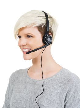 Photo of a cute young call center female with short blond hair and big smile wearing a headset.