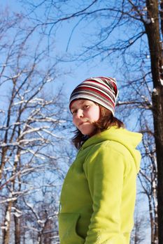 A teenage girl in the Park in the winter in January