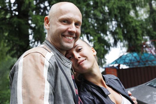 Happy father and daughter together in park