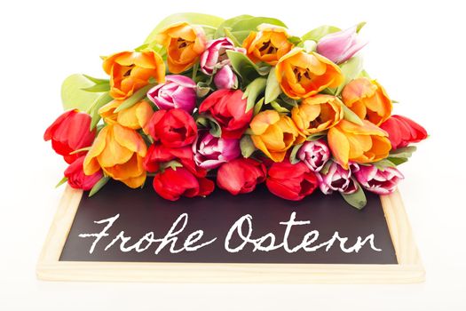 Bunch of tulips with blackboard: happy easter