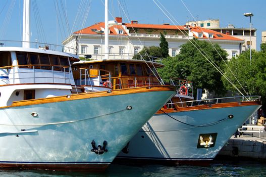 bows of touristic wooden boats (small cruiser) in Split, Croatia