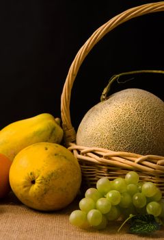 group fruits in dark background
