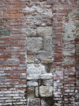 High definition photograph of a ancient worn wall in Italy shot in medium format Hasselblad and Phase One digital for maximum quality. Weathered Tuscan Wall in a closed up image