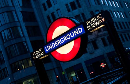 London Undergroudn Metro Tube Sign, public subway by night