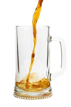 Beer pouring into glass isolated over white background