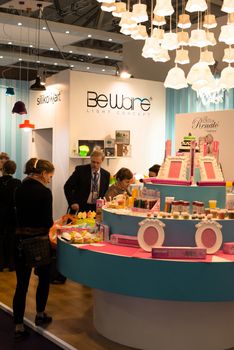 FRANKFURT, GERMANY – FEBRUARY 16, 2013: Booths of small companies producing decorative consumer goods on the Ambiente trade fair on February 16, 2013 in Frankfurt, Germany. Ambiente is the biggest exhibition for consumer goods worldwide.