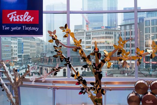 FRANKFURT, GERMANY – FEBRUARY 16, 2013: German kitchen accessories producer FISSLER is running a very creative shopping window campaign in Galeria Kaufhof store in Frankfurt´s famous shopping mile Zeil ) in downtown Frankfurt am Main, Germany on February 16, 2013. This activity is accompanying the Amiente trade fair, the biggest exhibition for consumer goods worldwide.