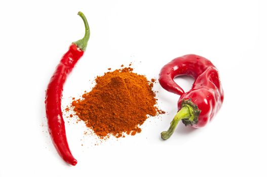 Red paprika ppepper with chili peppers isolated on white