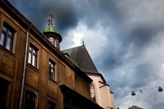 Dramatic dark blue sky over cathedral In Lvov in Ukraine