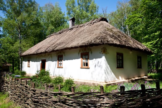 Ukrainian traditional hut in summer