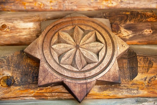 Wooden flower with circle and star
