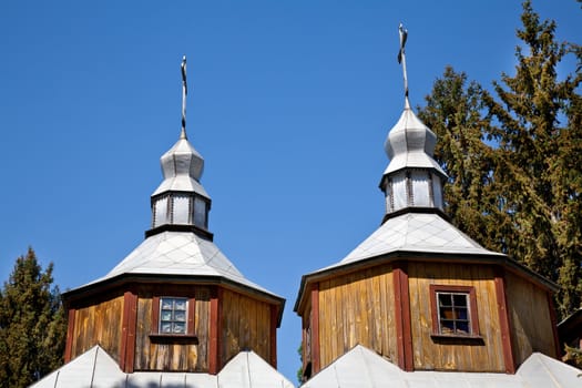 Two domes with crosses of wooden church