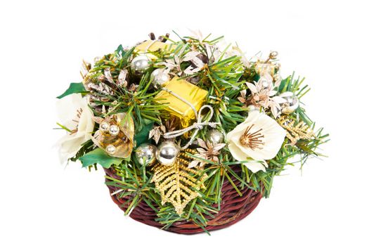 Christmas basket with golden and green decorations