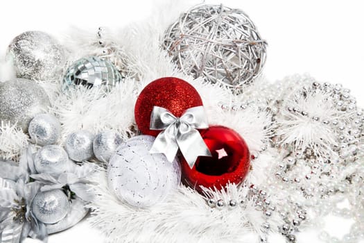 Christmas red and silver decorations on white background