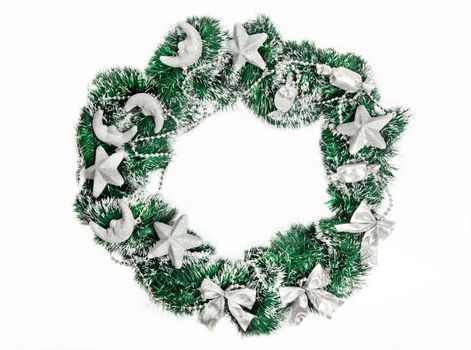 Christmas wreath with silver decorations on white background