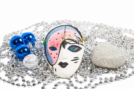 Mask with silver beads and blue balls isolated on white