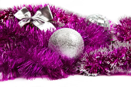 Pink christmas decorations on white background