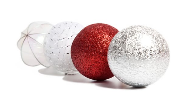 Red Christmas ball among silver and white