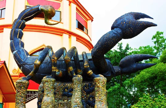 Side of the statue of the Black Scorpion