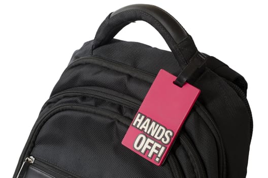 close of a rucksack with sign hands off on it on white background