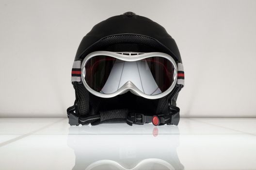 ski helmet and glasses with reflection shoot in studio