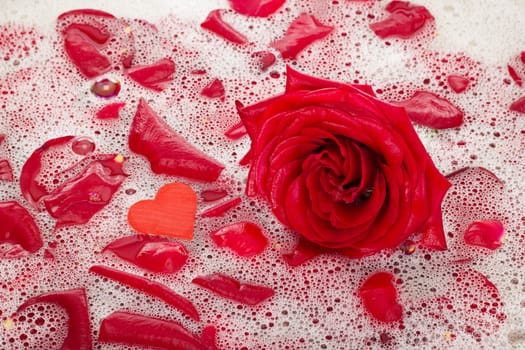 Bath water with rose petals