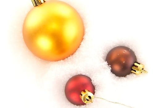 Christmas tree balls in snow