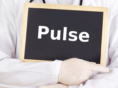 Doctor shows information on blackboard: pulse