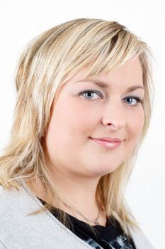 Portrait of cute smiling relaxing plump woman