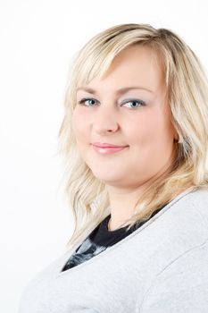 Portrait of cute smiling relaxing plump woman