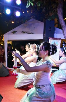 BANGKOK - DEC 16:Traditional Thai Dance at Phra Athit Walking Street, "Rattanakosin recall" festival on December 16, 2012 in Bangkok, Thailand. Its a tourist attraction primarily for night life and entertainment 