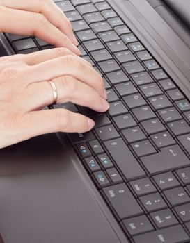 Person typing on the computer