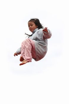 happy child outdoor jumping a summer day
against a white sky