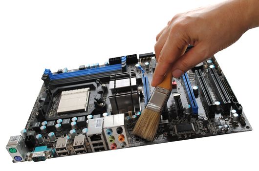 caring for the motherboard - clearing of dust with a soft bristle brush







cleaning the motherboard