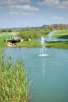 golf field with pond landscape