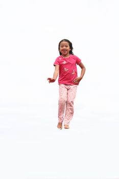 happy child outdoor jumping a summer day
against a white sky