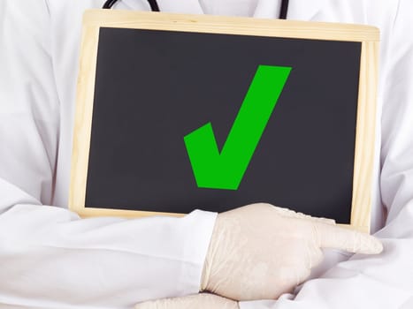 Doctor shows information on blackboard: yes