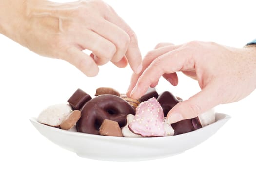 People eating some delicate gingerbreads