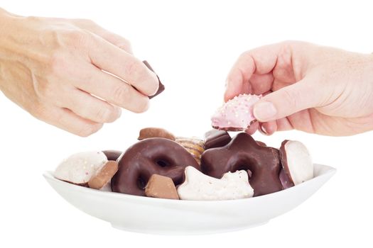 People eating some delicate gingerbreads