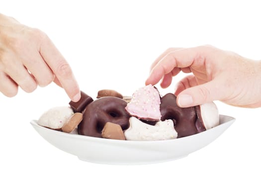 People eating some delicate gingerbreads