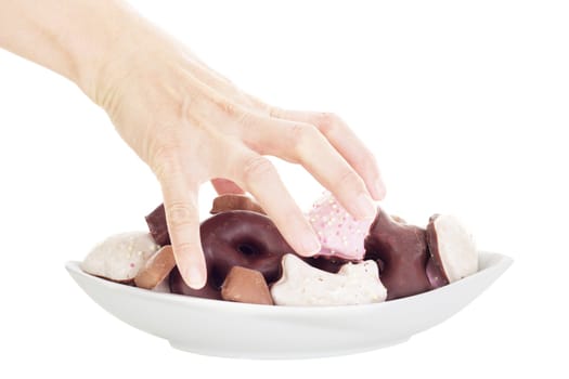 Person eating some delicate gingerbreads
