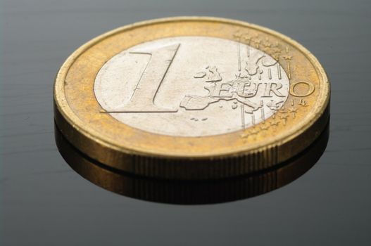 One Euro coin money isolated (European currency)
