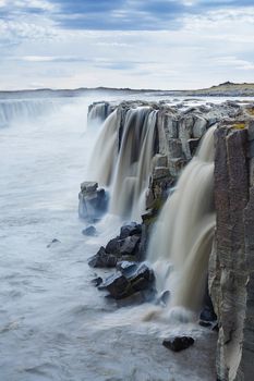 Selfoss Waterfall in Jokulsargljufur National Park Iceland. Vertical view