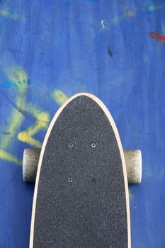 Detail of skateboard on the ground