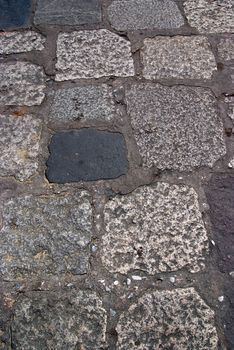 Old road paved with the cobble stones